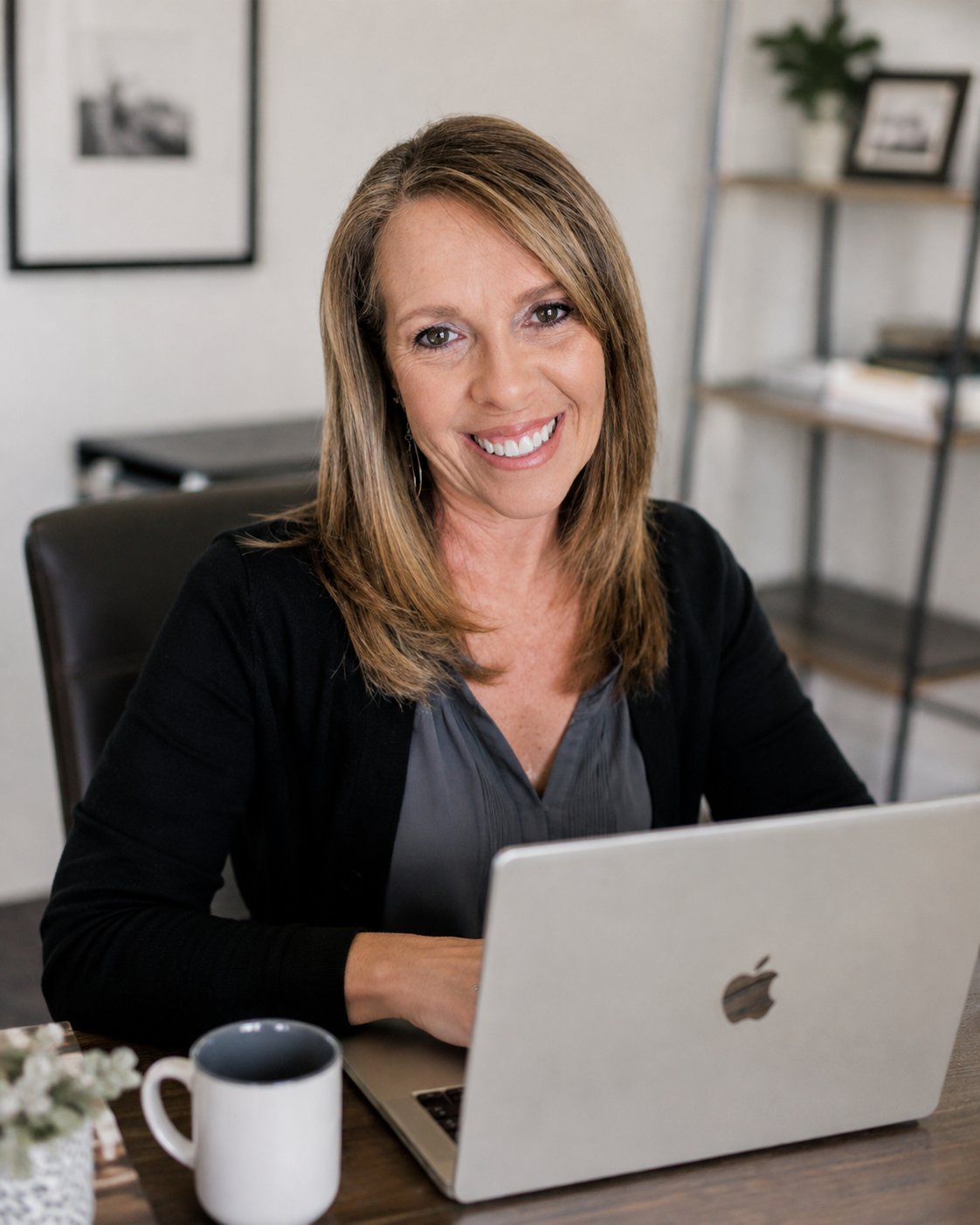 Gina Mastromarino, Founder of Brightline CFO, at her desk